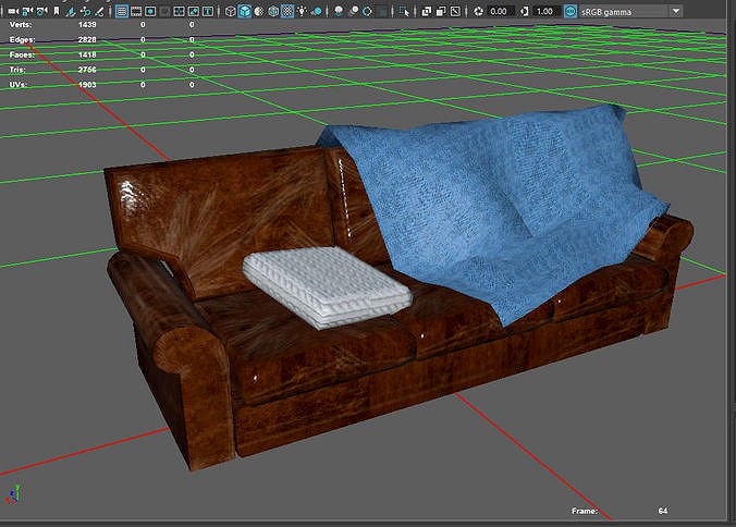 Couch with blanket and pillow scene