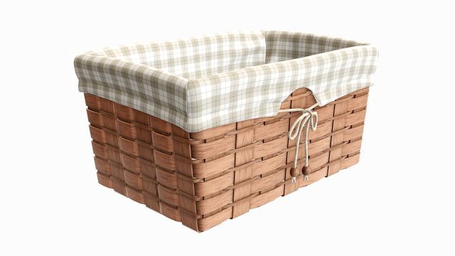 light brown wicker basket with fabric interior