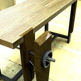 Modern Roubo Woodworking Workbench with crisscross scissor arm leg vise