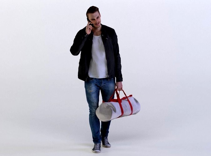 Mark 0454 Man carrying a duffel bag, talking on a phone