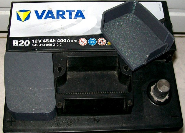 Covers for VARTA car battery terminals (right and left).