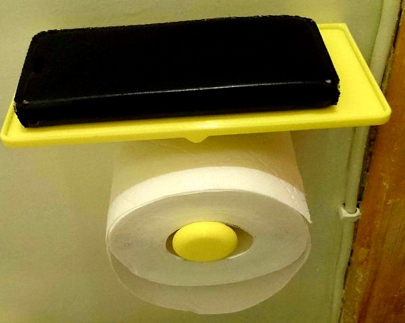 Toilet paper holder with phone holder