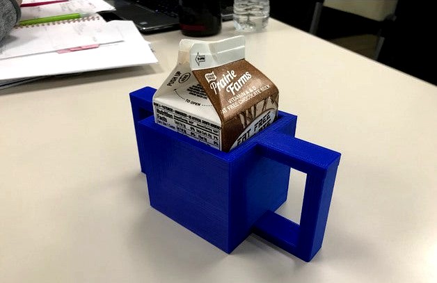 Two handed milk carton holder  by OTandAT