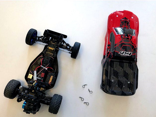 Body mounts for Tamiya DT-02 RC car chassis by tylerking