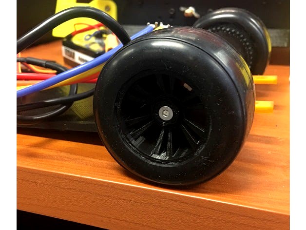 Tamiya stock rims for OpenRC F1 and store bought F104 tires. by jpottaway