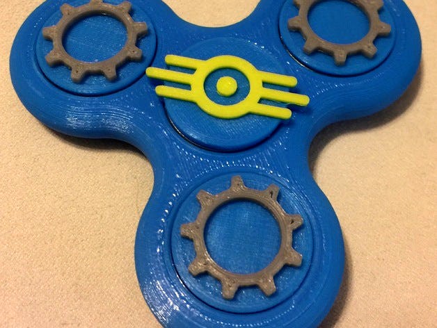 Fidget Tri-Spinner with Themed Bearing Caps by Spiraldox