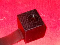 Box Case for RPi Camera Module With Lens by swampyness