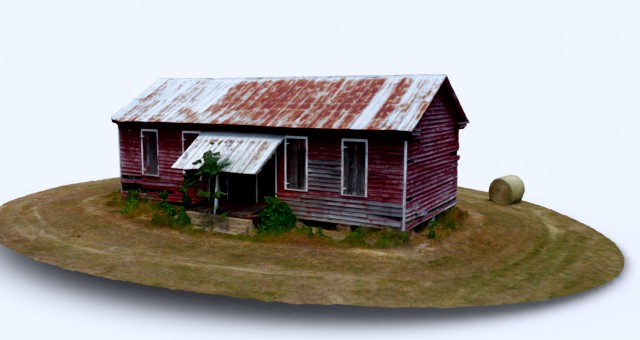 abandoned farm house with hay