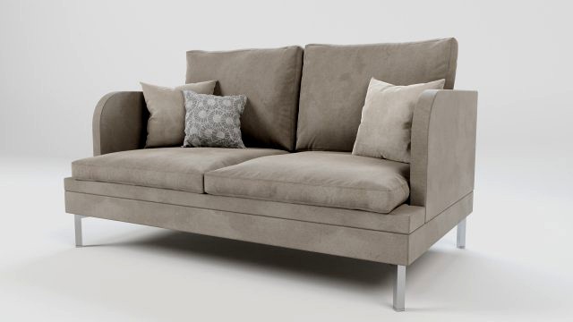 suede couch with pillows