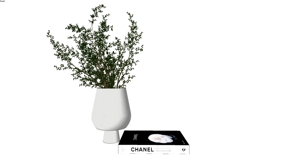 Vase with greenery and Chanel Book