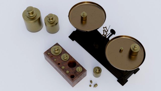 Rigged vintage balance scale with weights