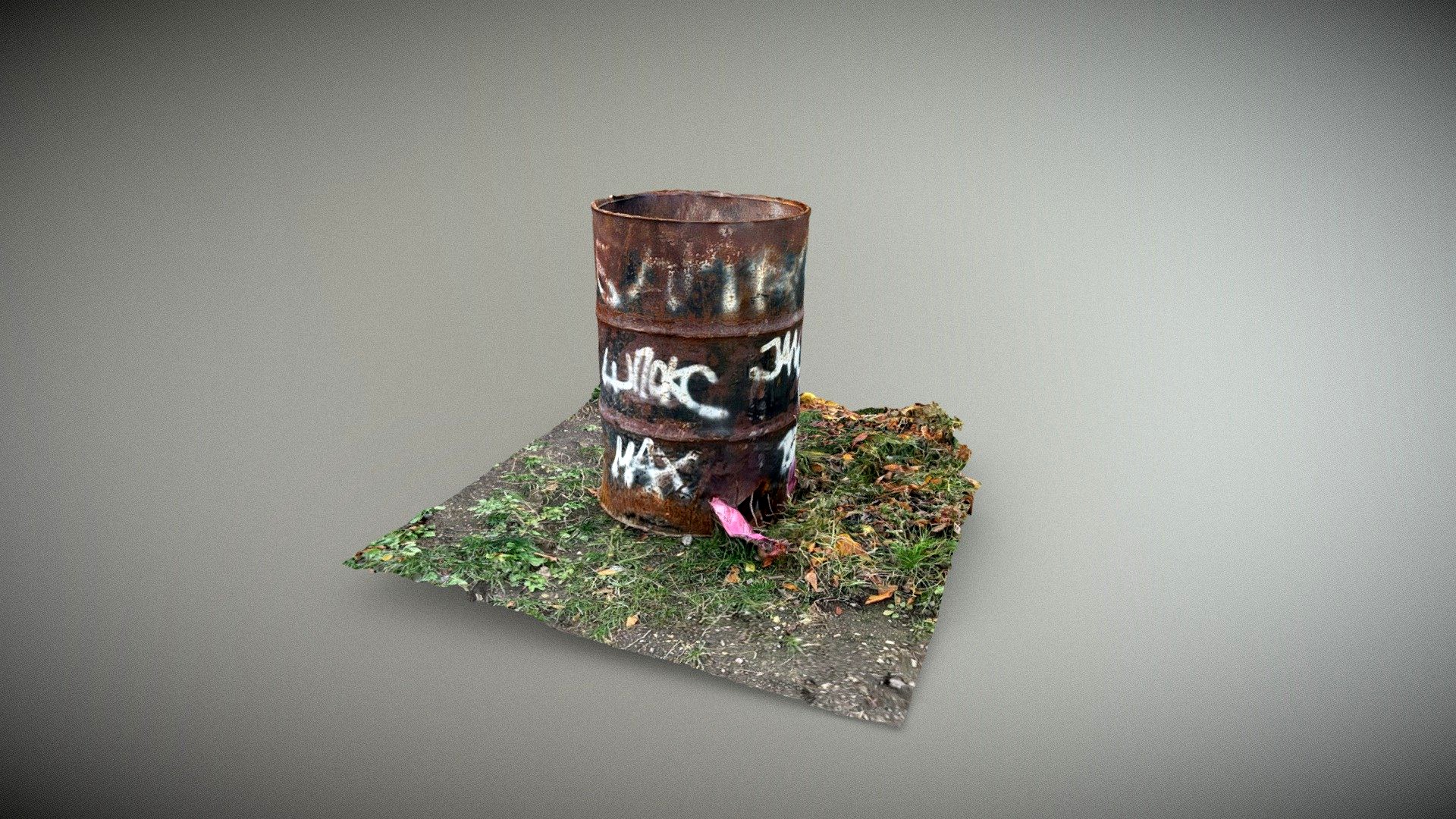 Trash bin / old oil barrel with graffiti