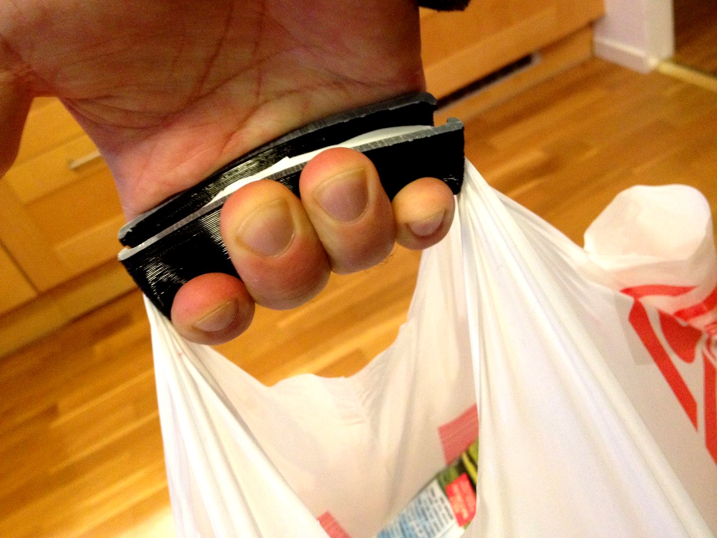 Flexible Plastic Bag Handle with "coins"