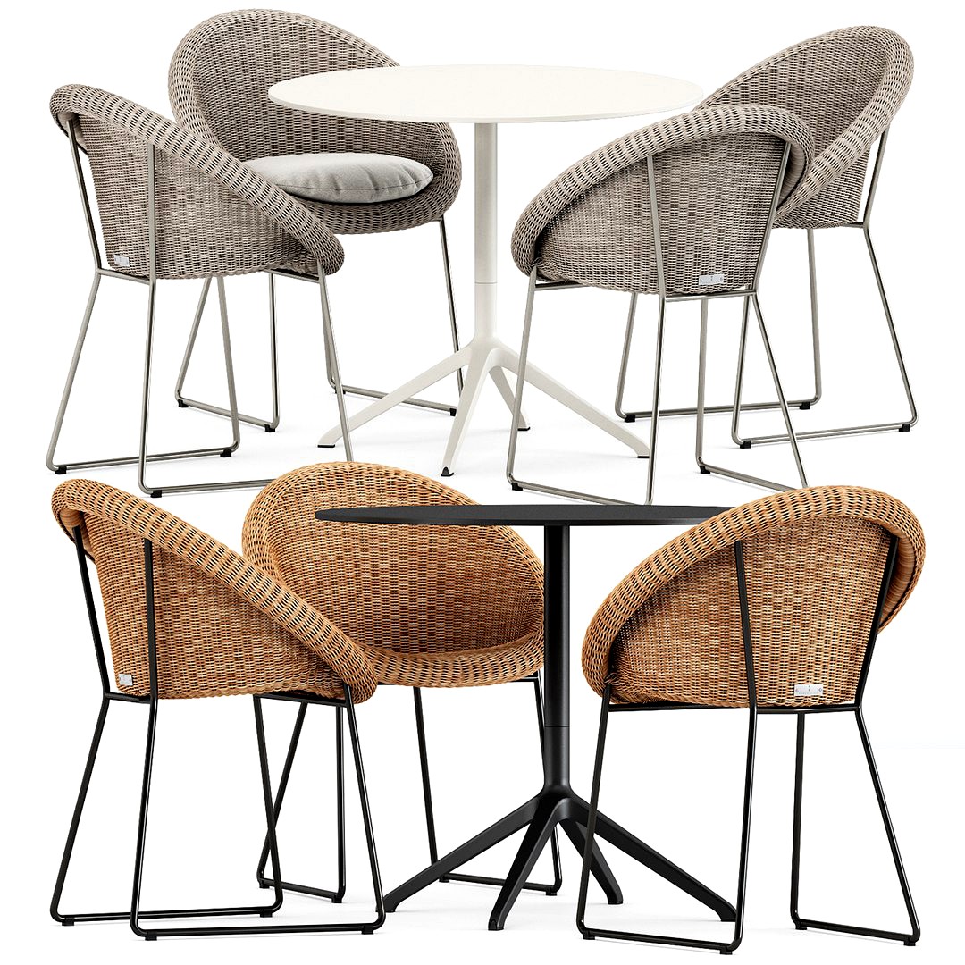 Gigi II Armchair by Janus et cie and Elephant round table