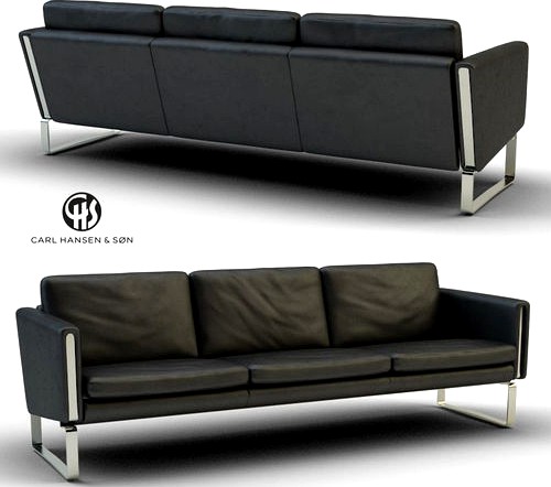 Black leather three-seater sofa