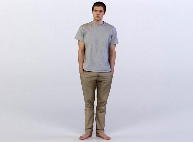 Liam 0082 Man standing barefoot, arms in pockets