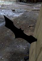 Batarang stuck in a wall