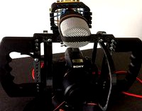 Micro holder for cage modular DSLR