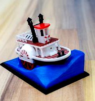 Old paddle-wheel steam boat with display stand (visual benchy)