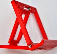 Foldable tilting tablet/phone stand