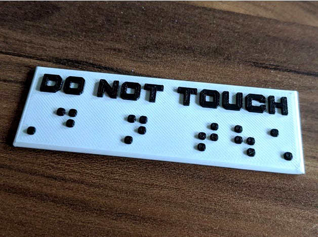 Braille " Do not touch "