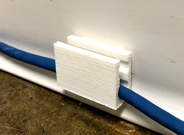 Wall-Mounted Network Cable Guide