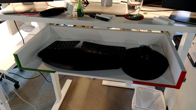 Desk drawer to keyboard tray border