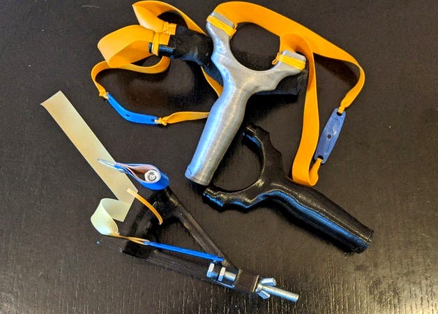 Ergonomic slingshot with magazine v2 + Poch and Jig to Band Tie