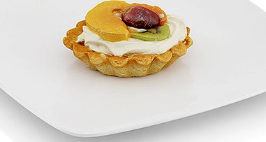 Cupcake with cream and fruits