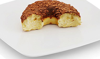 Bitten donut with chocolate