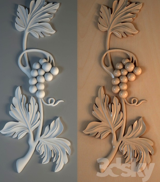 Decorative carved stucco element