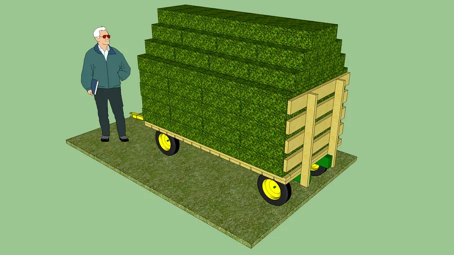 Garden tractor hay wagon with small bales of hay