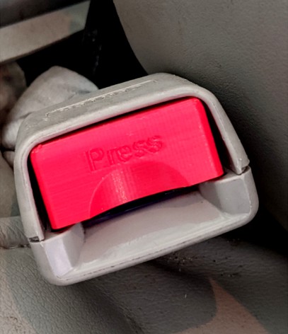 Mazda seatbelt release button by wdeninger