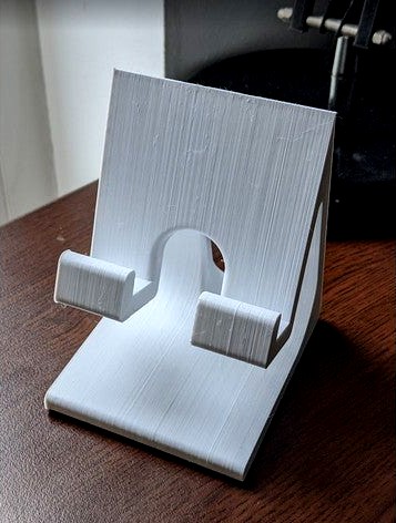 phone stand with charging hole by vladggg123