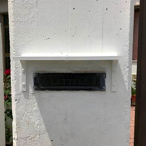 Postbox slot cover by jollino