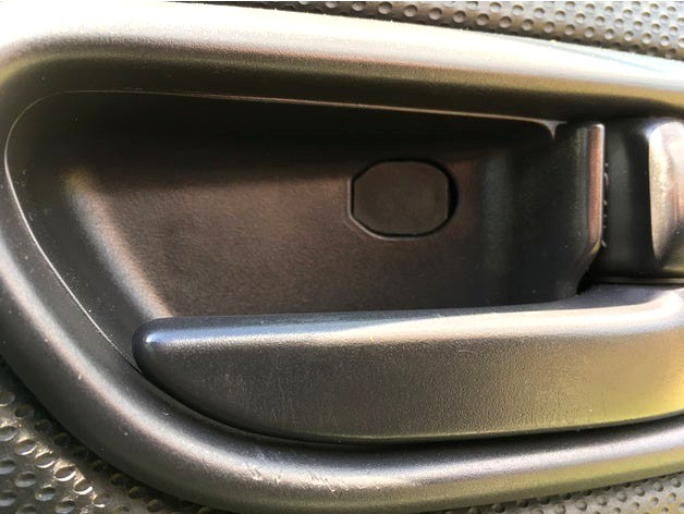 Subaru Forester SG (2002 - 8) door release lever screw cover. by GRay_111111