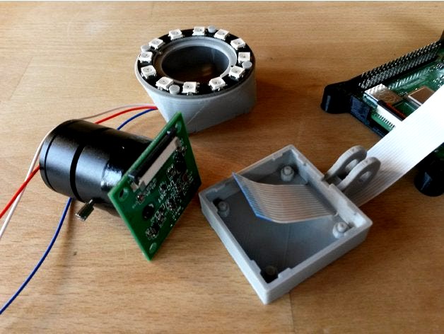 OctoLapse camera holder with NeoPixel light by lynspm