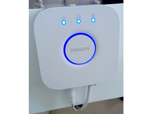 Phillips Hue Bridge mounting for Ikea Malm desks by jameswilddev
