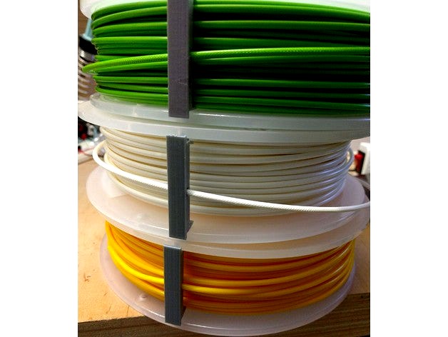 Filament holder for the UM3 spools by MakeKu