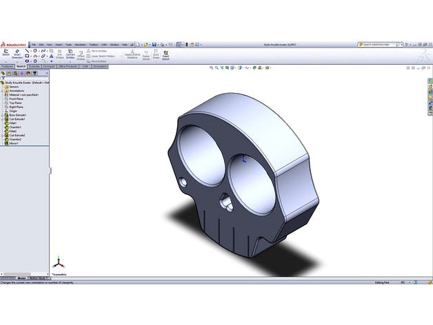 Skully Knuckle Duster by gwidgery