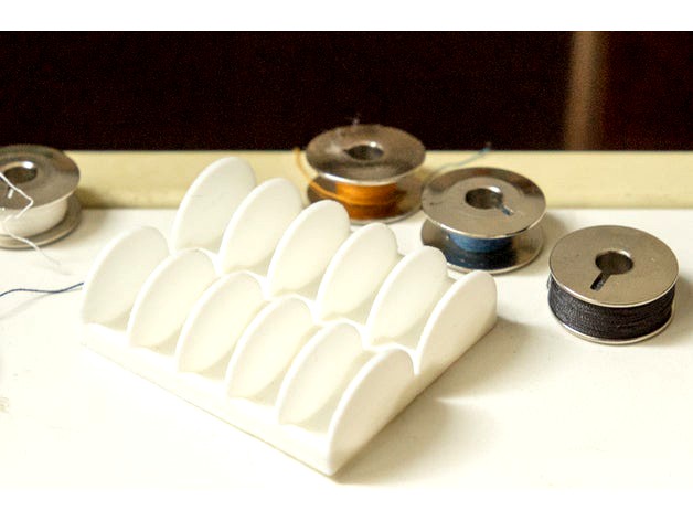 minimalistic thread bobbin holder by bettercallitart