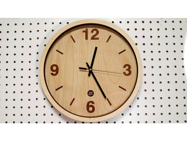 Wooden clock renewal laser cut by Focma
