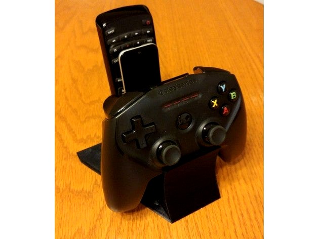 Game controller and remote control holder by snuffy