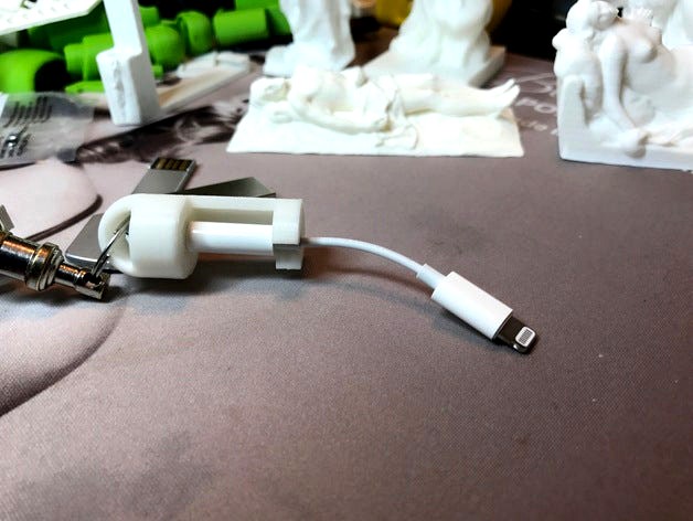 Apple Lightning to 3.5 mm headphone adapter keychain by suzujoji