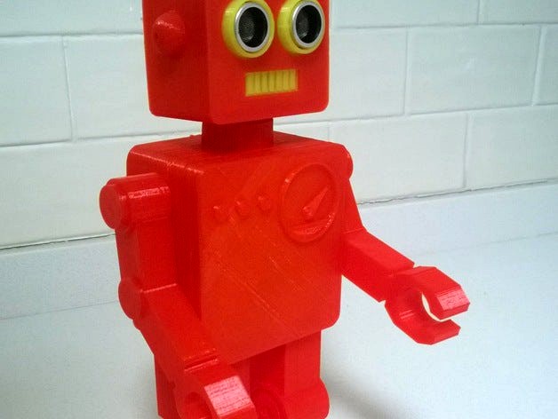 Robot with ultrasonic distance measuring sensor and microcontroller by NirDobovizki