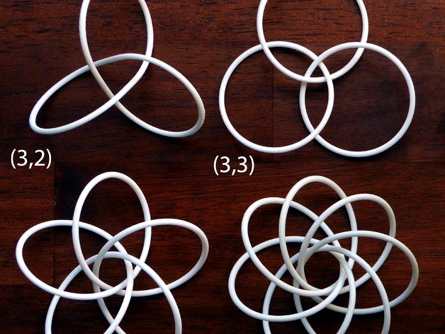 Three torus knots and a torus link by henryseg