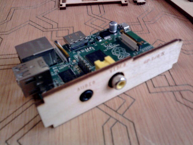 Raspberry PI birch wood enclosure with Lego holes by killor