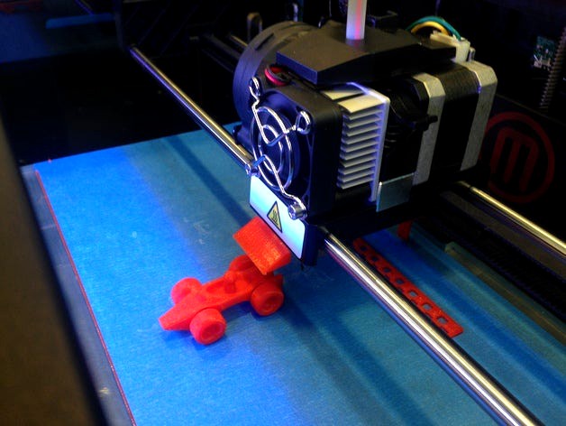 Toy Racecar Getting Pushed off the Build Plate by printeraction