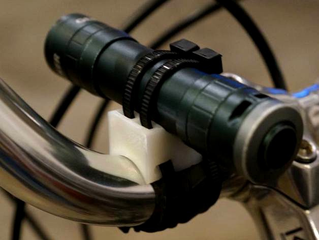 Bicycle Flashlight Clip - Handlebar Headlight by cosmoose