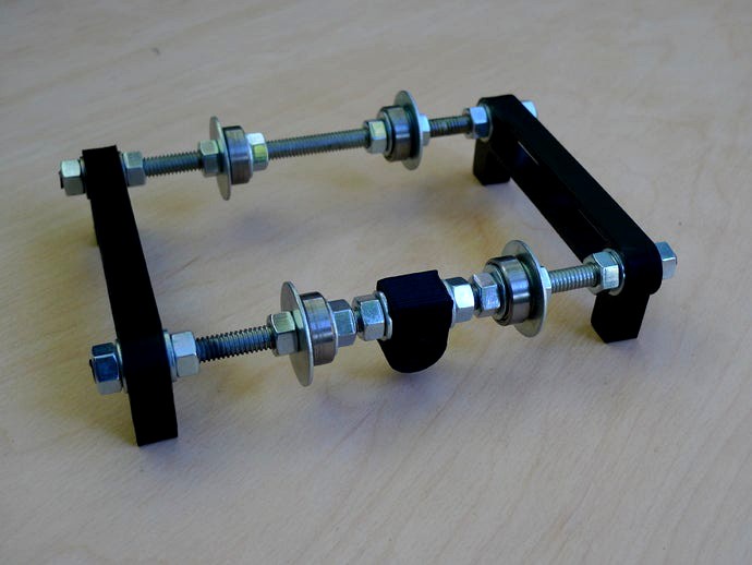 RepRap Adjustable Filament Spool Roller  by schlem